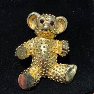 Golden Teddy Bear Brooch with Red Gemstone